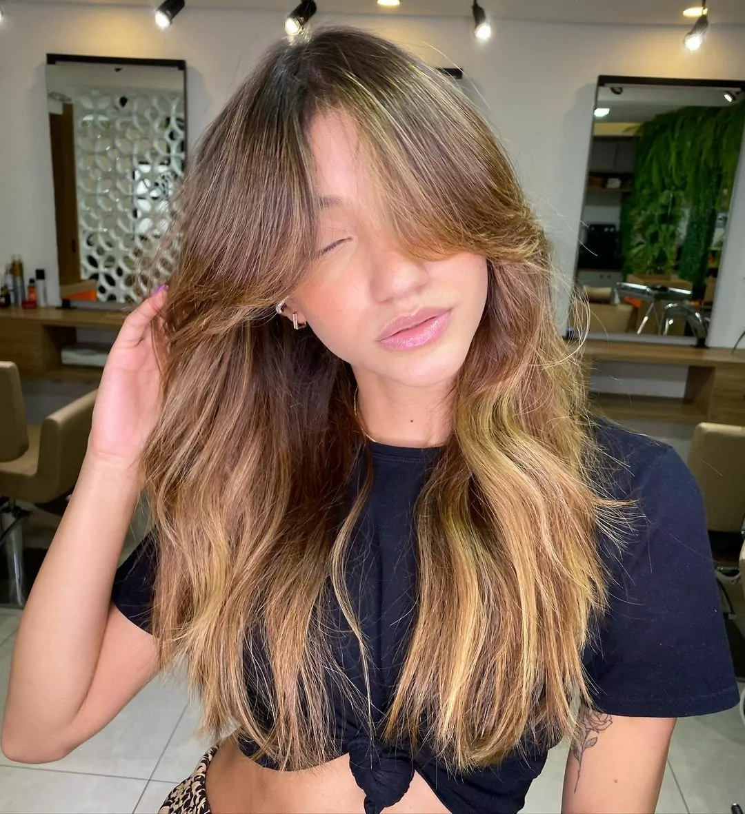 corte de cabelo com franja longa