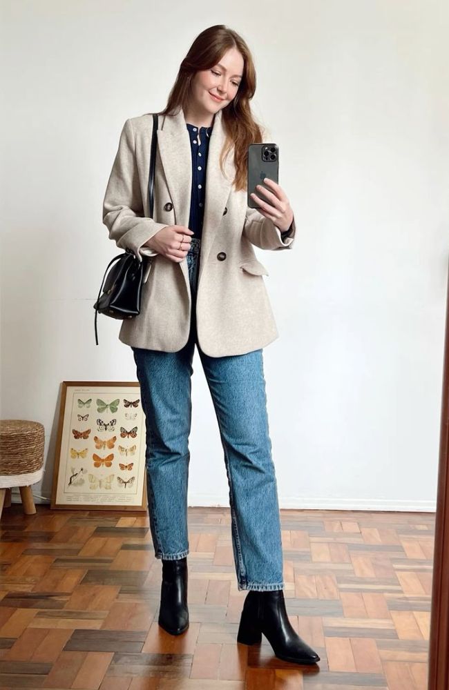 look calça jeans e bota inverno 2025