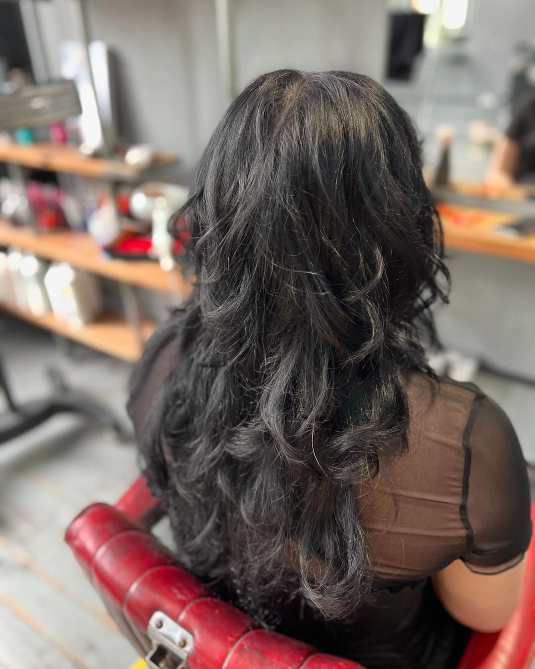 wolf cut para cabelo ondulado com franja